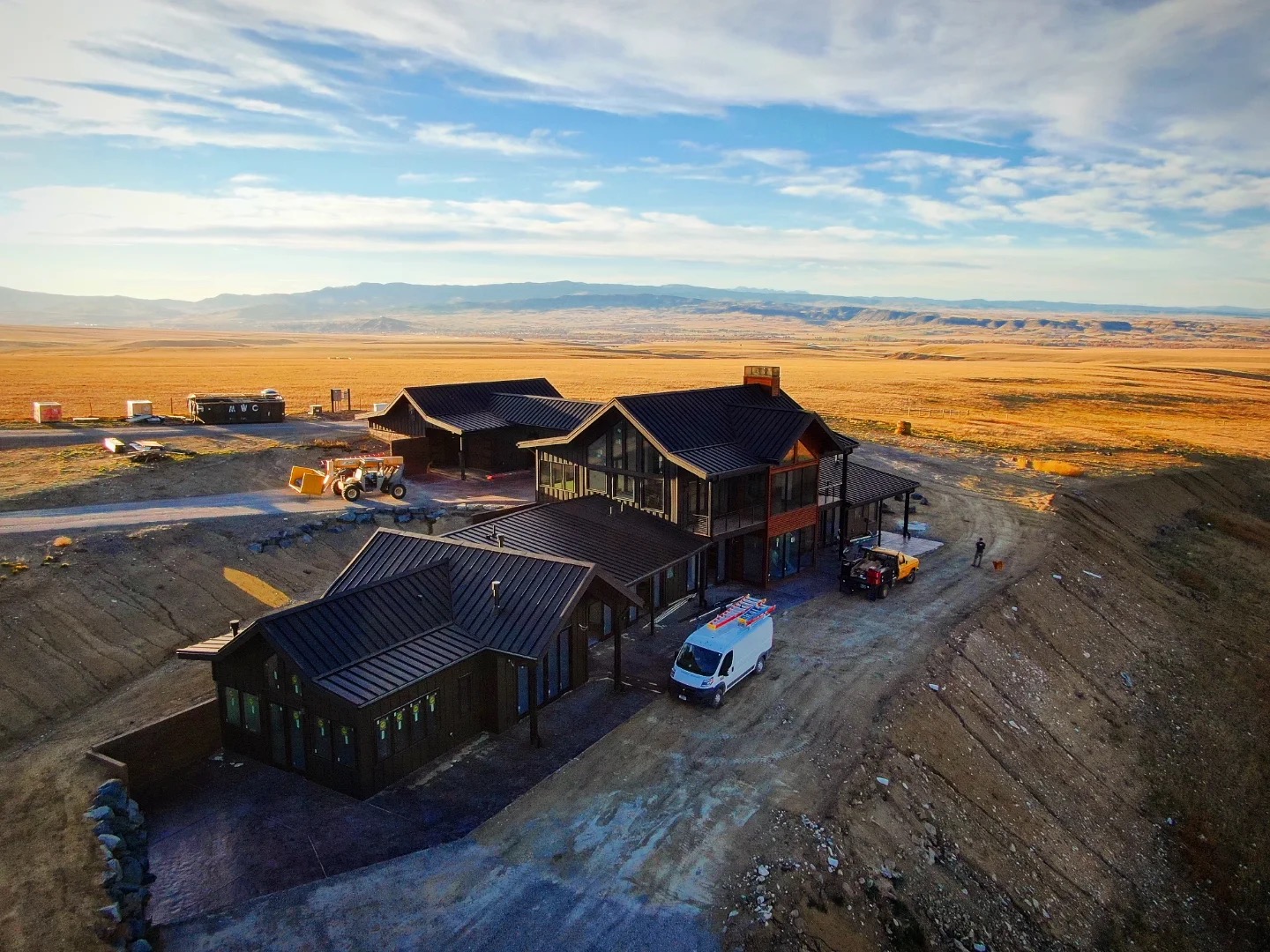 Aerial view of completed custom home overlooking the valley