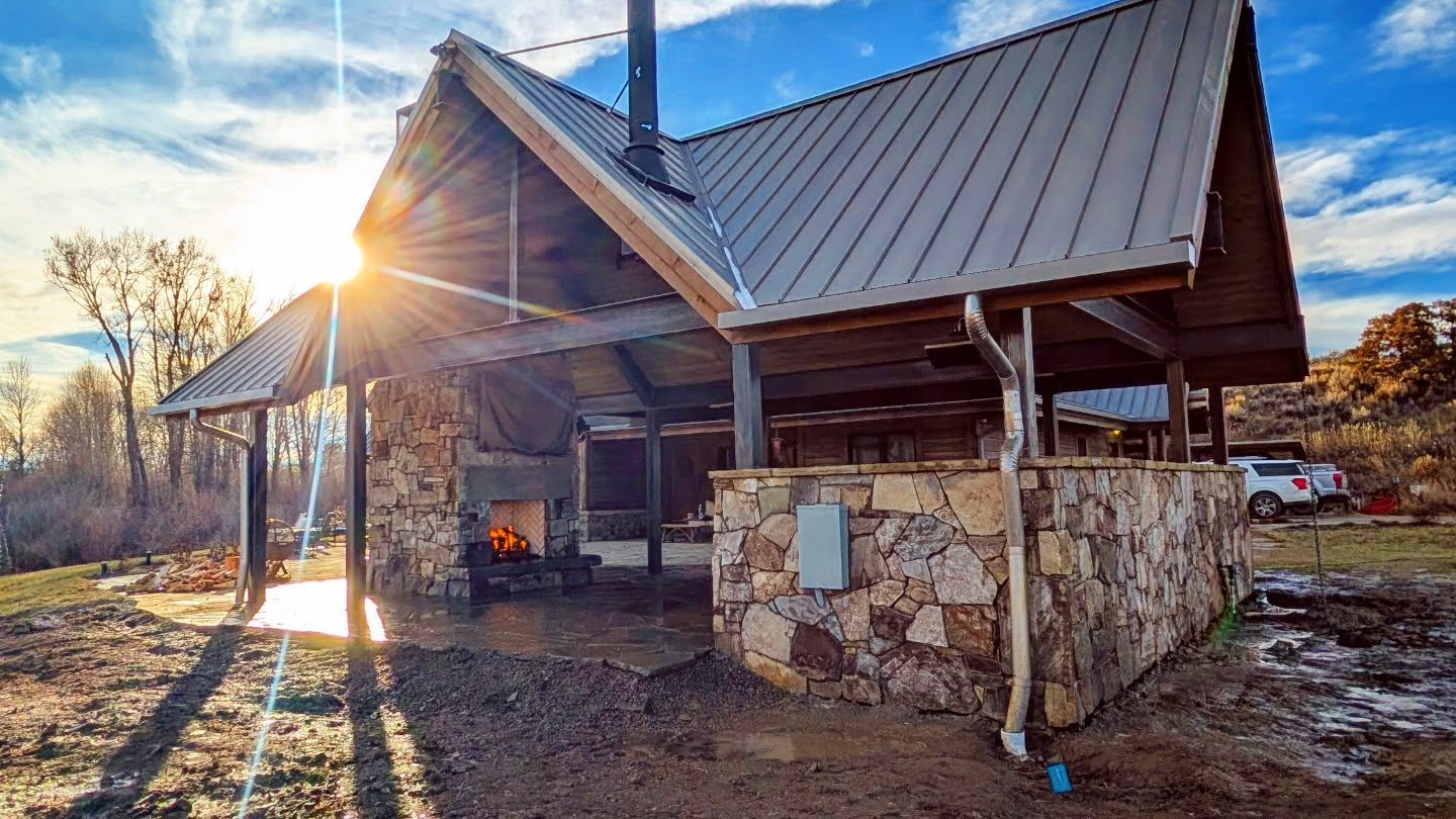 Custom outdoor fireplace pavilion at sunset, Paradise Valley