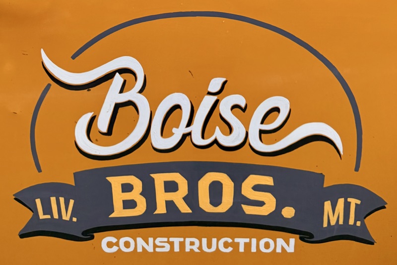 Hand-painted Boise Bros. Construction logo on the company truck